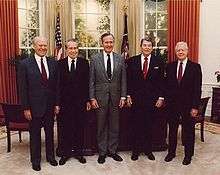 Jimmy Carter (far right) in 1991 with President George H. W. Bush 