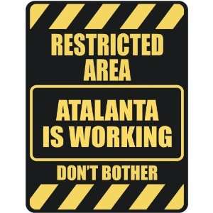   RESTRICTED AREA ATALANTA IS WORKING  PARKING SIGN: Home 