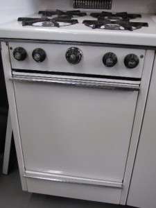Dwyer Kitchenette with cabinets gas stove, refrigerater, sink, 4 