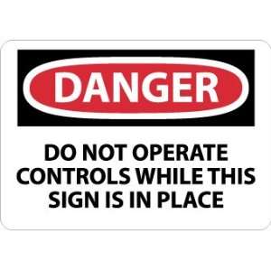  SIGNS DO NOT OPERATE CONTROLS WHILE