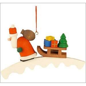    Ulbricht ornament   Santa with Sled on wooden arch