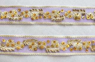 jacquard woven motif adorns this organza ribbon. Then tiny beads 