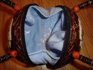 Maui Style Coconut Purse Handbag with Flower. Coconut is approximately 