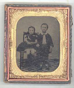 CIVIL WAR ERA TINTYPE OF A BOY AND A GIRL WITH A DOLL  