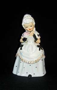 VINTAGE JAPAN HAND PAINTED CHASE LADY WITH FLOWERS FIGURINE  