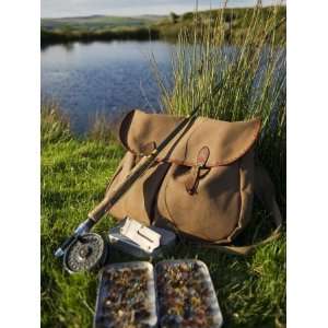 Wales, Conwy, A Trout Rod and Fly Fishing Equipment Beside a Hill Lake 