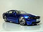 2010 Ford Mustang GT FastBack CANDY BLUE w. WHITE RACING STRIPES 1:24 