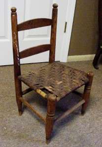   woven wood seat. The design of this chair is simple, yet ~sturdy
