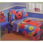 bedding set with elkmo and cookie monster in bright colorful patterns 