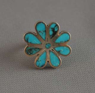This vintage Zuni silver ring shows a flower with beautiful channel 