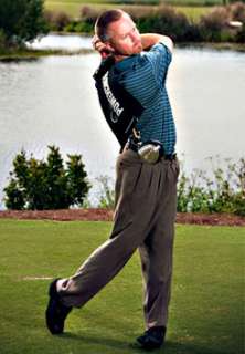 The transitional sequence of movements from the backswing to the 
