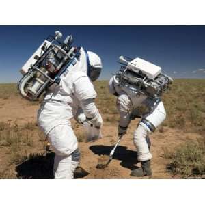  Two Astronauts Collect Soil Samples During Desert Rats 